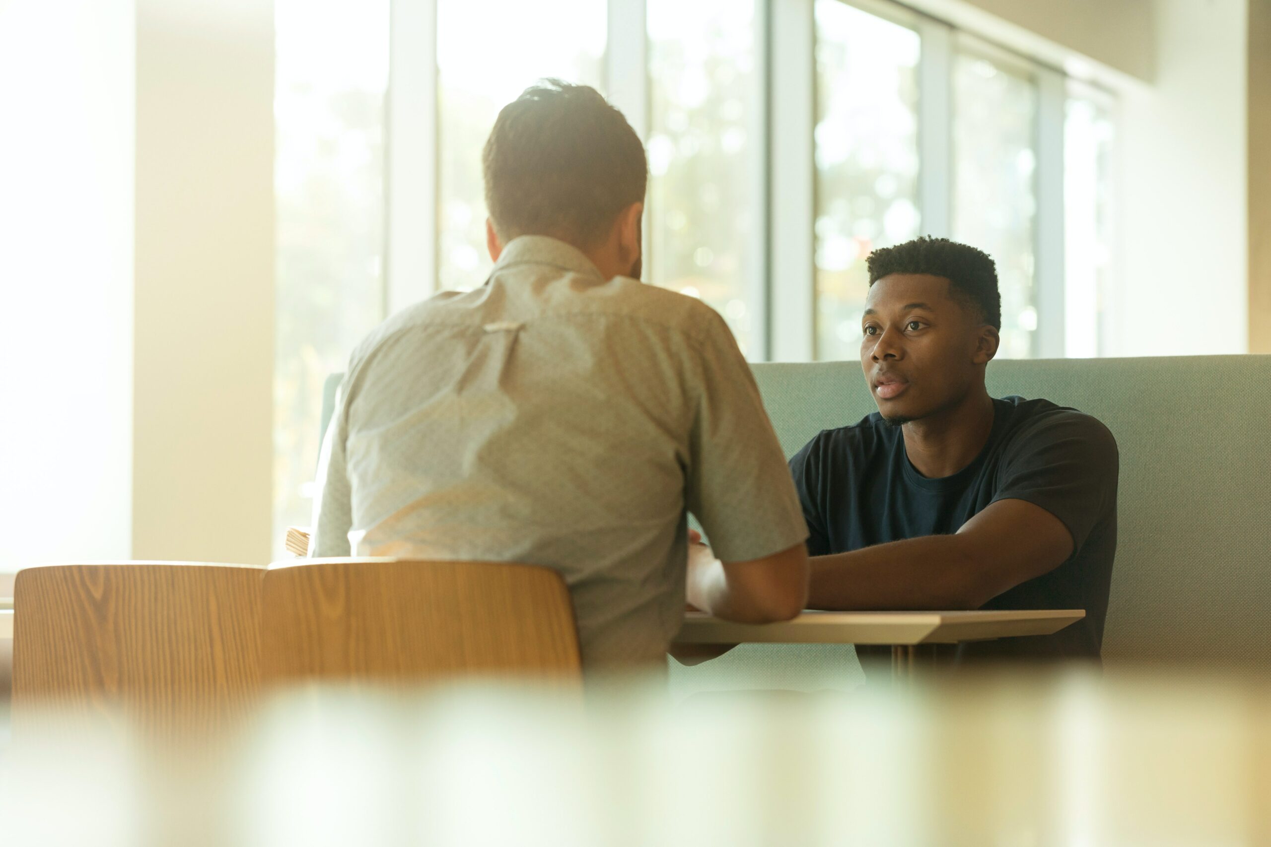 men talking-unsplash